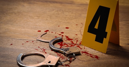 blood and handcuffs and crime scene