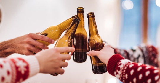 cheers with beers at Christmas